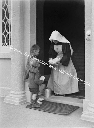 SISTER CORA (MT STANNE'S MILLTOWN),WITH POOR CHILDREN